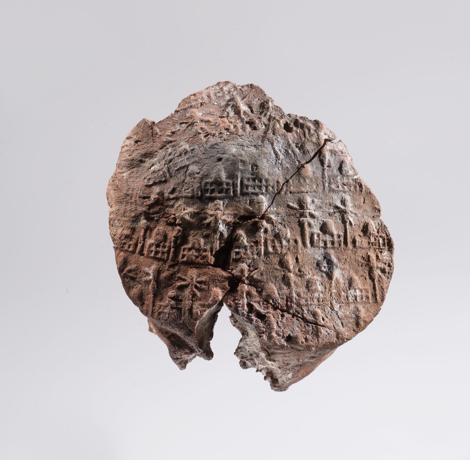 A clay jar sealing impressed with the name of Neithhotep